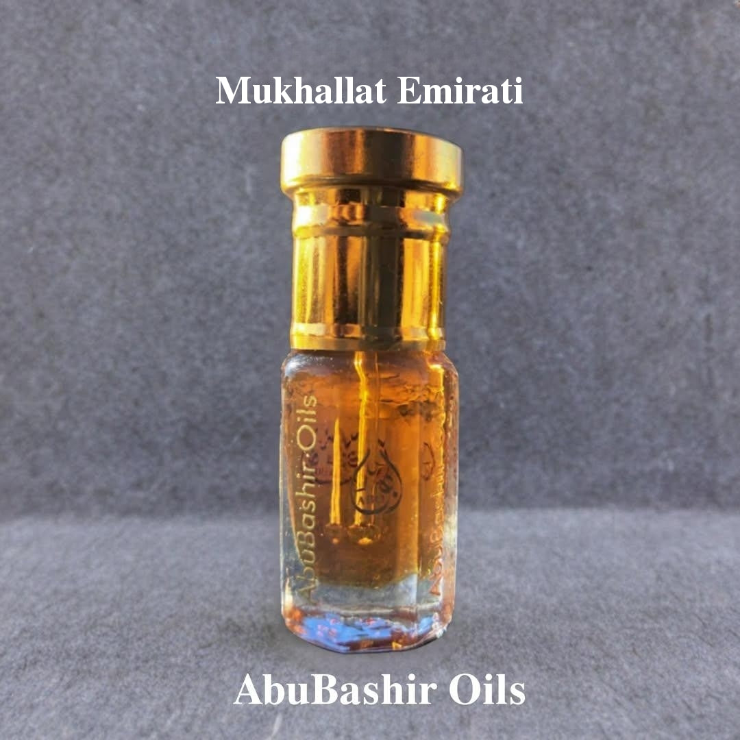 Mukhallat Emirati perfume oil by AbuBashir Oils in a small glass bottle with gold cap showcasing traditional Arabian fragrance blend
