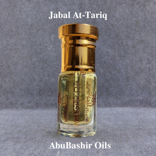 Jabal At-Tariq alcohol-free fragrance oil with citrus, amber, spice, musk, and woodsy notes by AbuBashir Oils