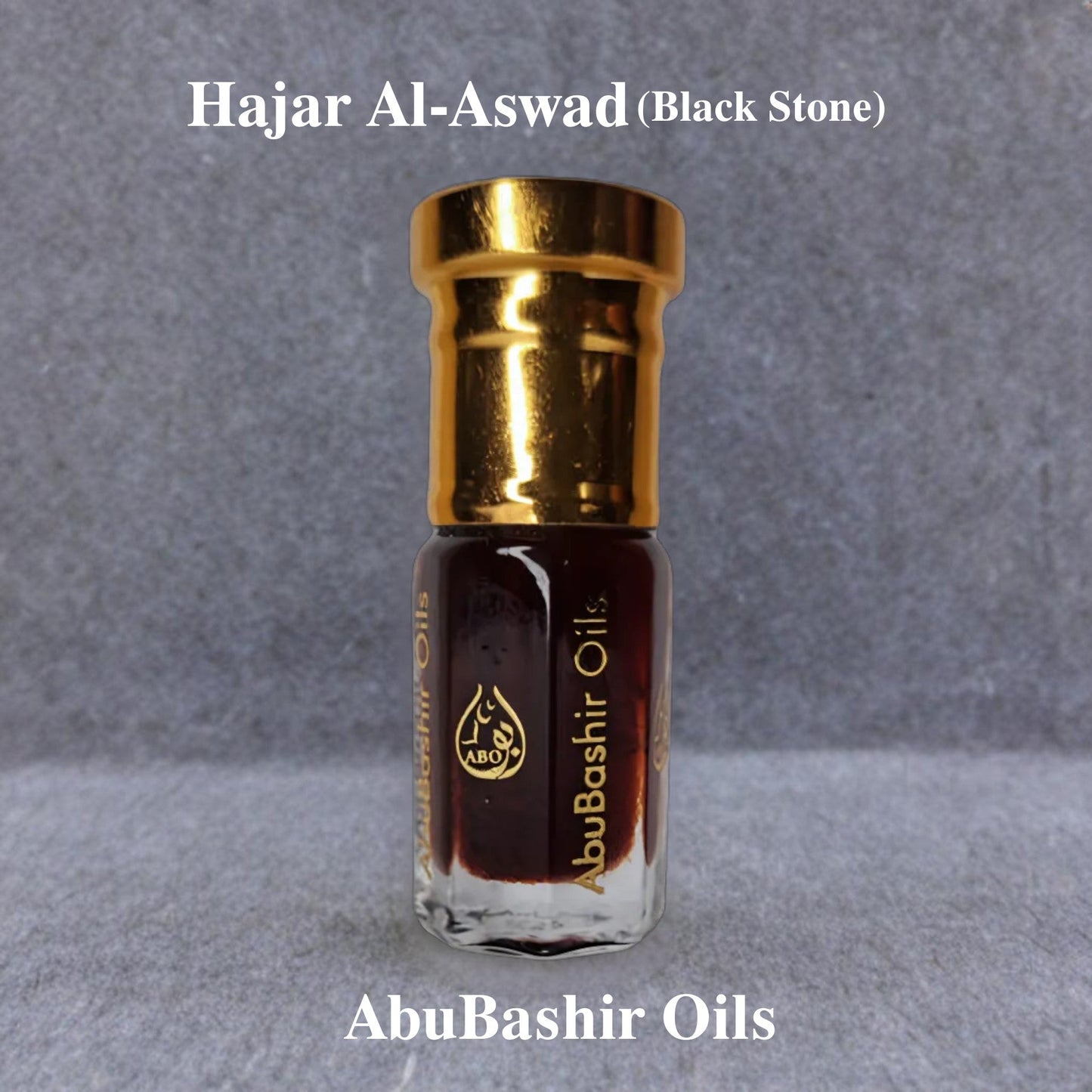 Hajar Al-Aswad (Black Stone) fragrance oil by AbuBashir Oils with amber and citrus notes in a gold-capped bottle