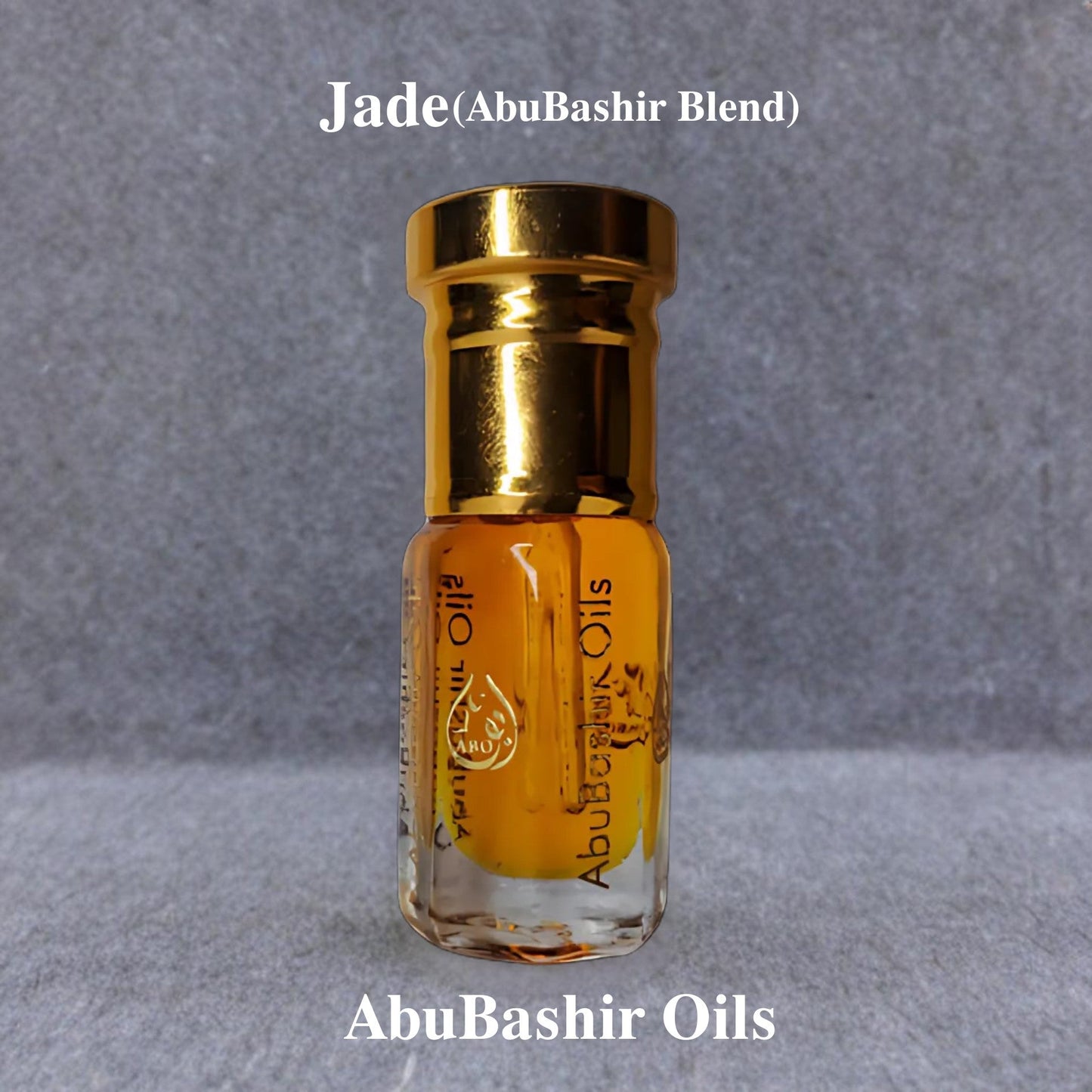 Jade(ABO MIX) fragrance oil by AbuBashir Oils with amber base and citrus top notes in a small glass bottle with gold cap