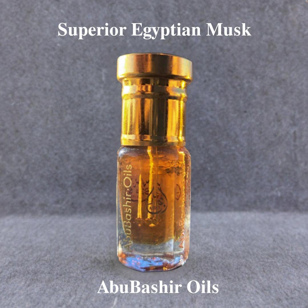 Superior Egyptian Musk fragrance oil bottle by AbuBashir Oils with amber-colored liquid and gold cap