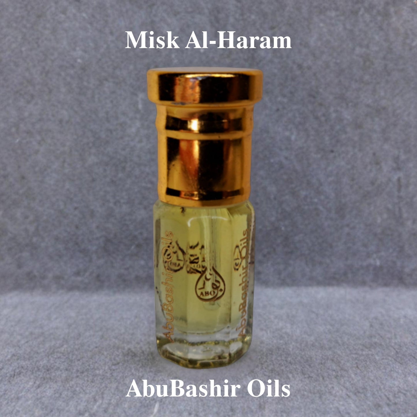 Misk Al-Haram perfume oil by AbuBashir Oils in elegant bottle with golden cap, alcohol-free Arabian musk fragrance